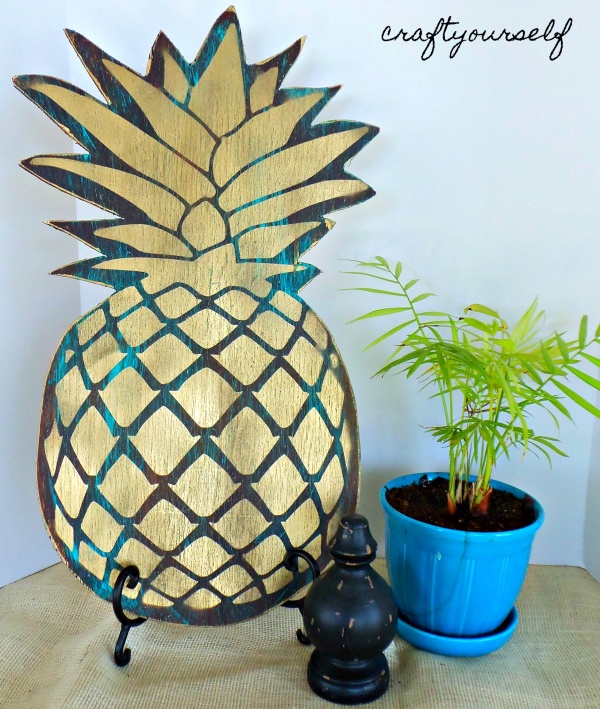 antiqued pineapple decor